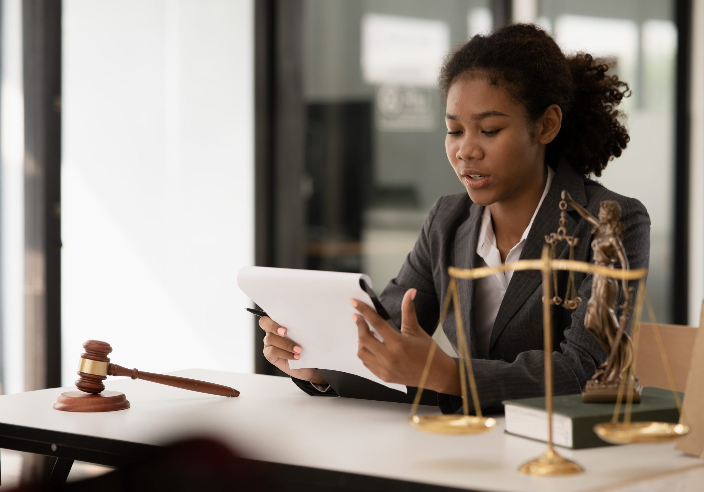 Asian woman lawyer businesswoman shake hands agree with Legal affairs client at the office.